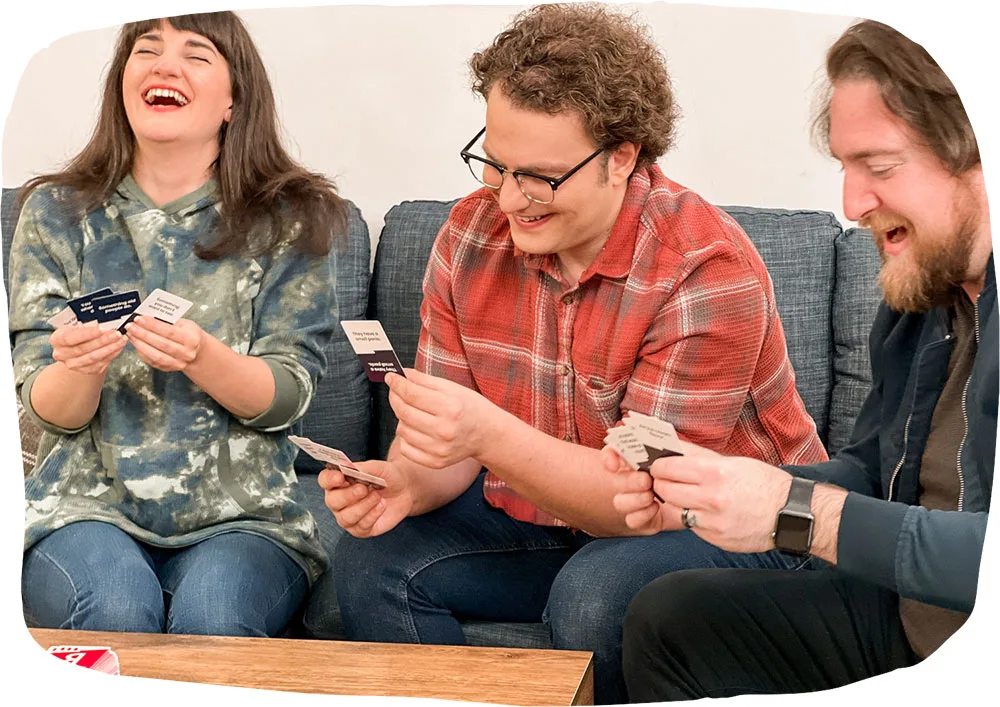 Friends laughing while playing Slingz